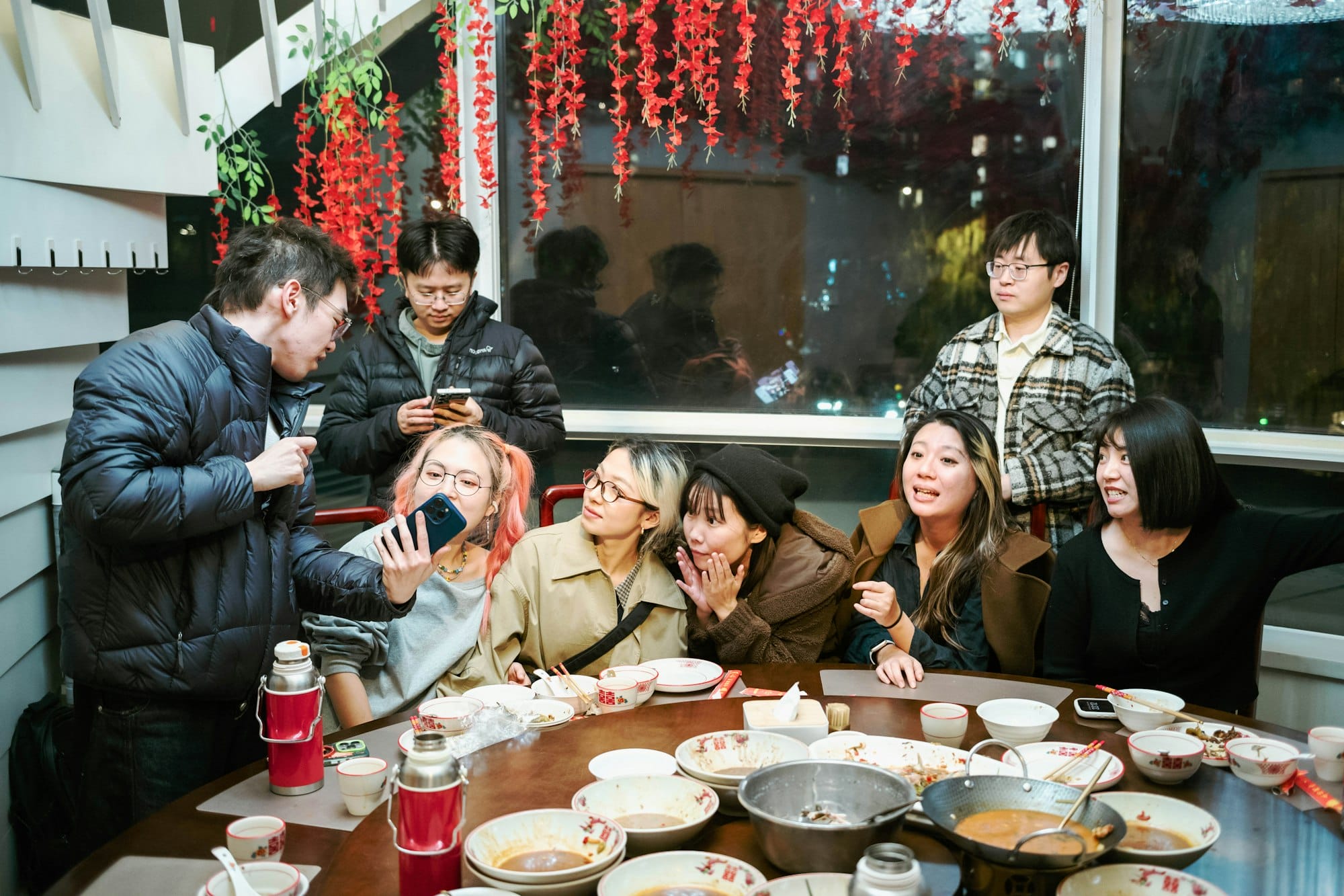 Friends sharing a meal, the kind of connection our mental health clinic helps people rebuild
